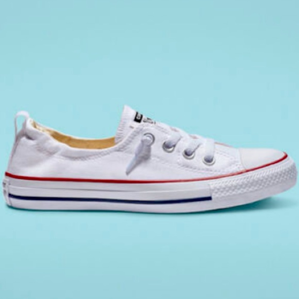 White Converse slip ons